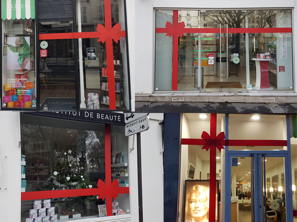 Poseur signalétique Paris, vitrophanie, adhésif et installation de décors